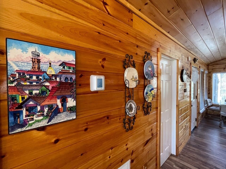 Single-level living — bright, art-filled halls all on one floor