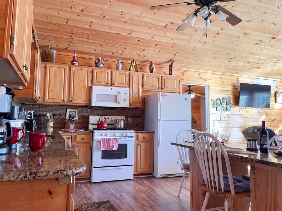 Full kitchen — granite counters and full-size appliances for cooking in