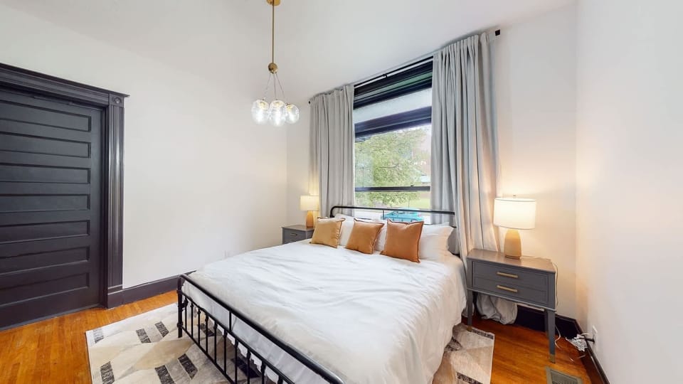 Bedroom 1: Our master bedroom has a comfy queen-sized bed with high-quality sheets and a soft comforter that's perfect for lounging all day.