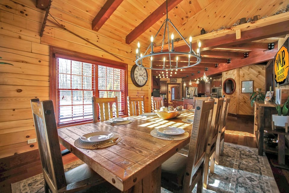 Seating for 8 at the dining table and space for 4 at the island, additional seating in the basement.