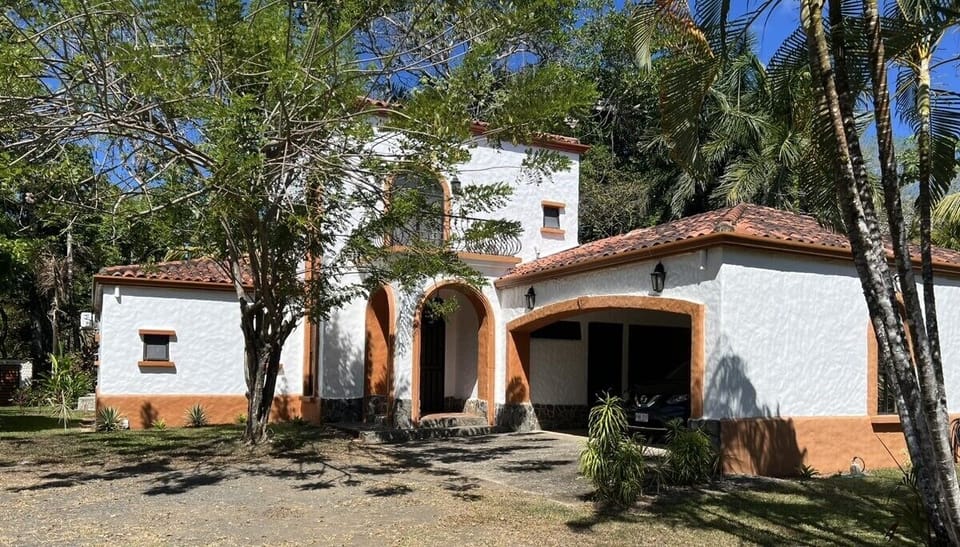 Front view of house and carport