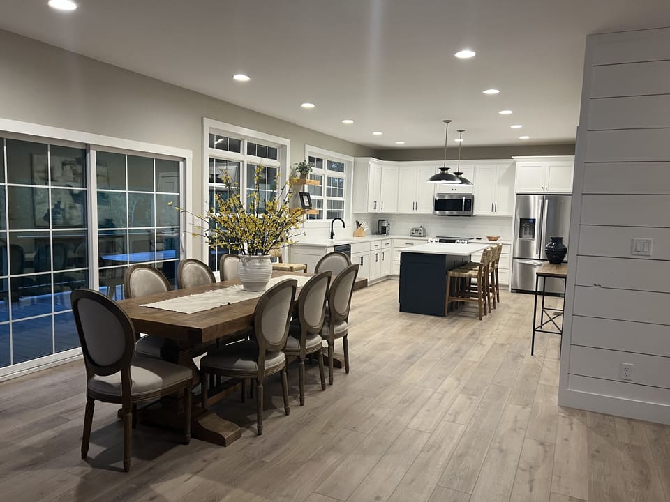 Kitchen table seating for 8 and kitchen island seating for 3-4.