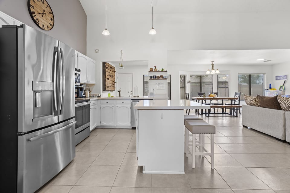 Remodeled kitchen with stainless steel appliances.