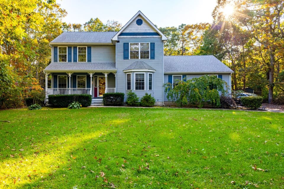 Beautifully maintained home with lush lawn and peaceful surroundings, perfect for family getaways or group vacations.