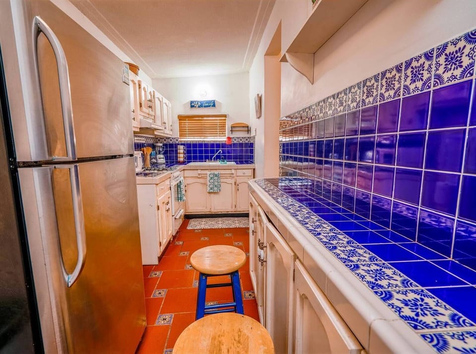 See the full kitchen layout before you book. This overview of Casa Barquito vacation rental in San Felipe BC shows you counter space, appliances, and how the kitchen flows into the dining area.