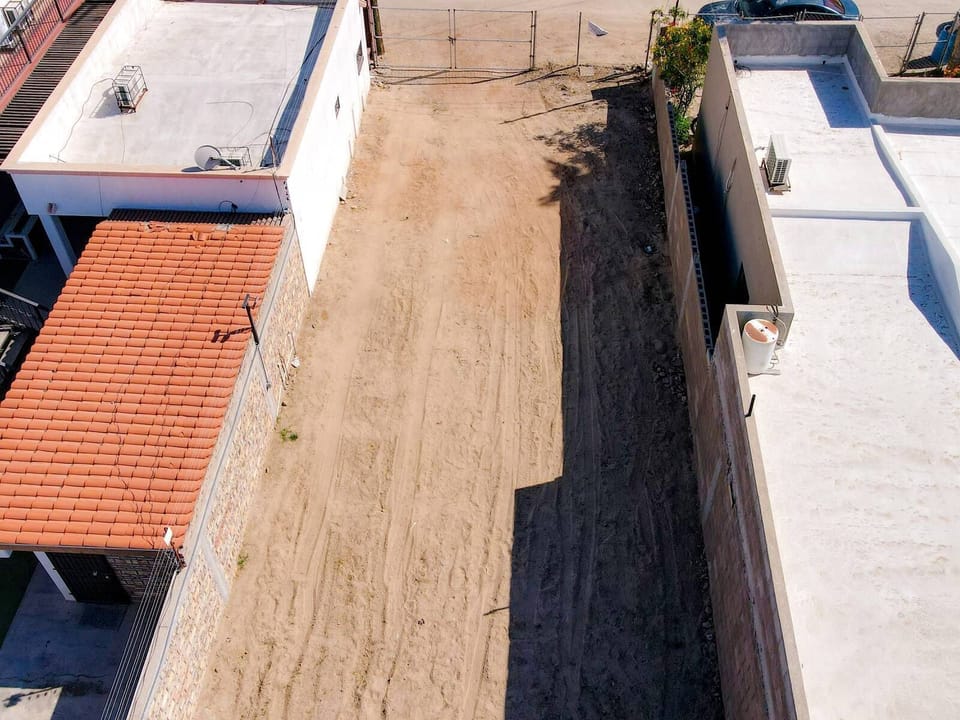Park with peace of mind. This fenced parking lot at Casa Barquito vacation rental in San Felipe BC MX keeps your vehicles secure and off the street throughout your stay