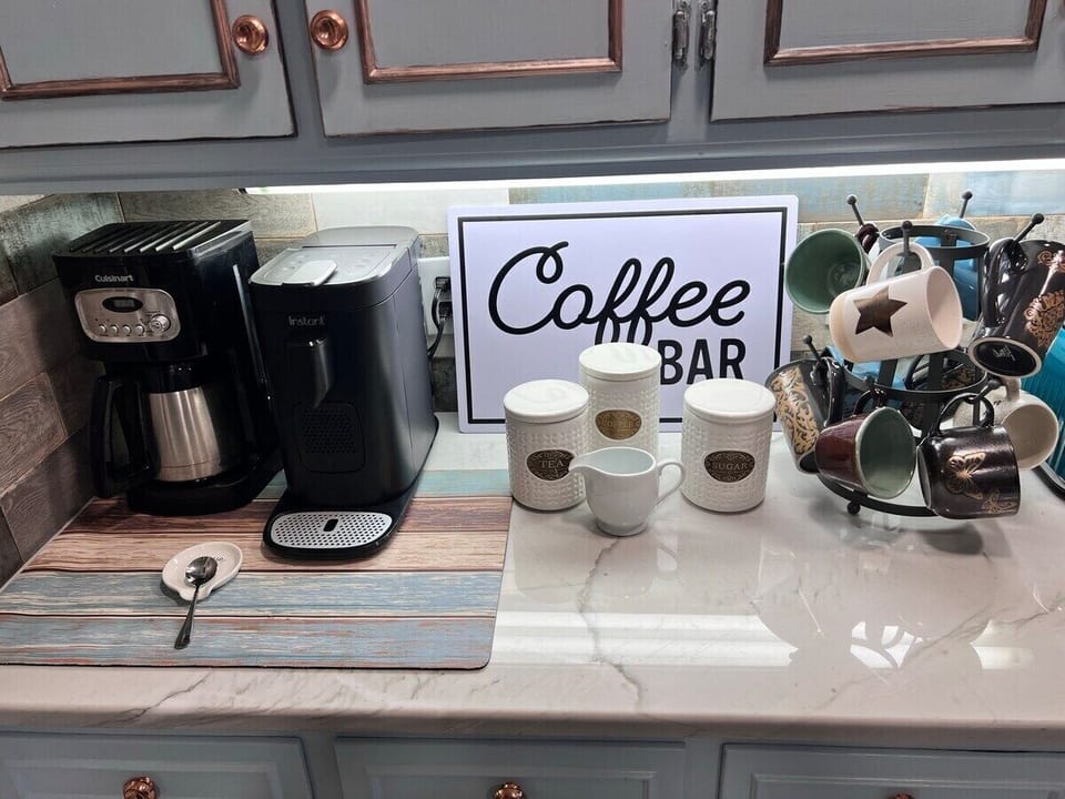 Keurig, Nespresso, and drip coffee with pods, sweeteners, and creamers