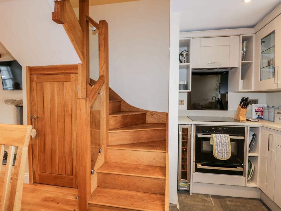 Fridge, dishwasher, electric kettle, cookware/dishes/utensils