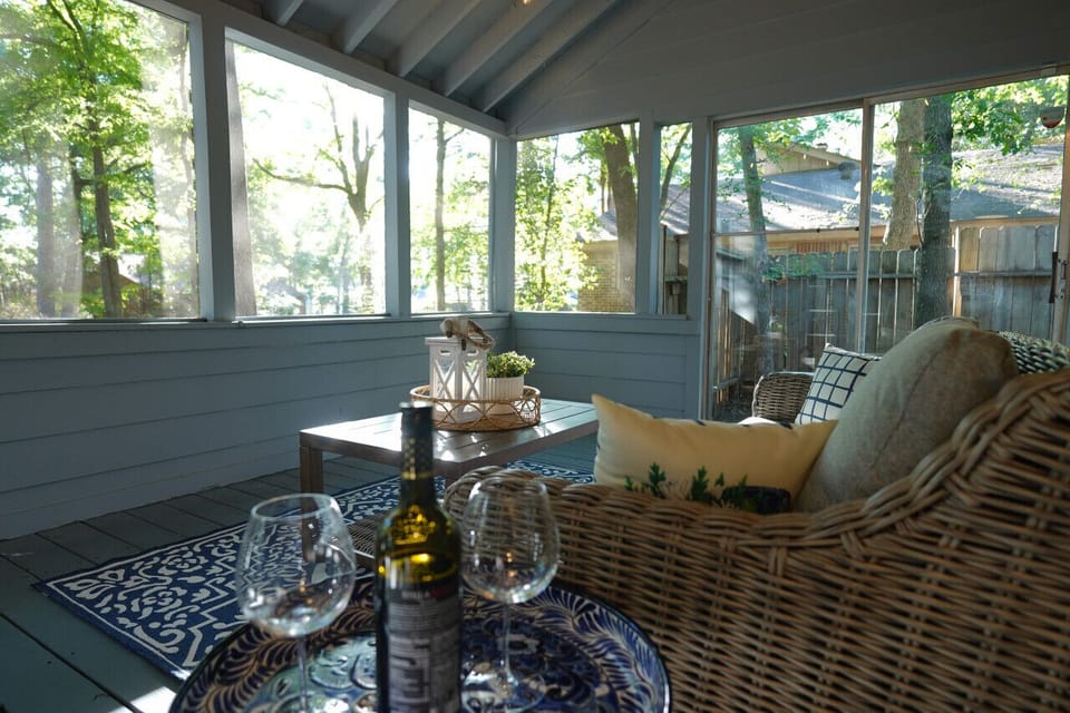 `Relax in our serene screened porch, wrapped in nature`s embrace. Sip wine as you soak up the view, the perfect serene getaway to enjoy those quiet, reflective moments.`