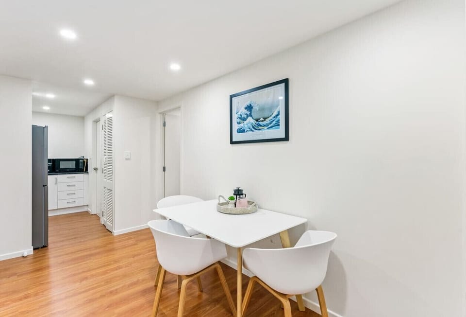 The dining space is in between the lounge and the kitchen.