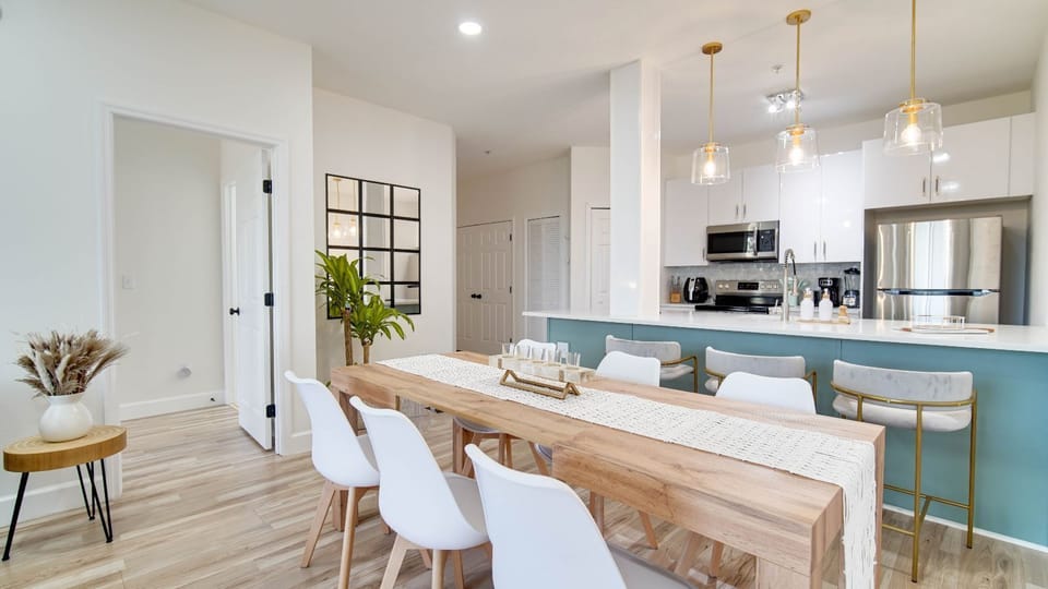 Farm-style table, perfect for family dinners, comfortably seats 6. 