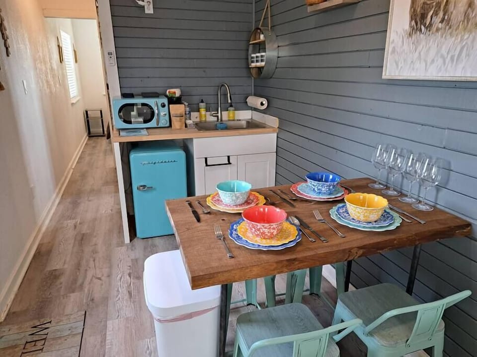 Dining area for four and kitchenette.