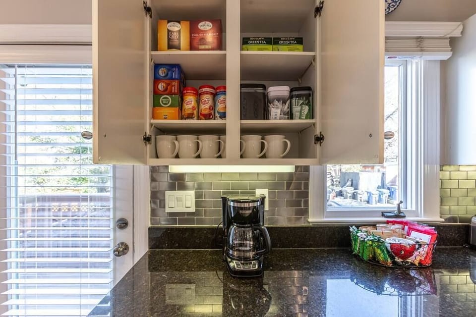Coffee and Tea station plus a basket of yummy snacks