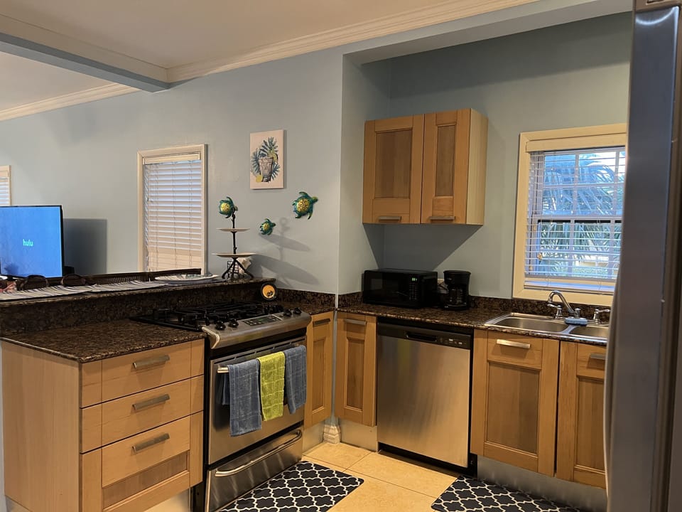 Kitchen with new Microvave, Dishwasher and Refeigerator