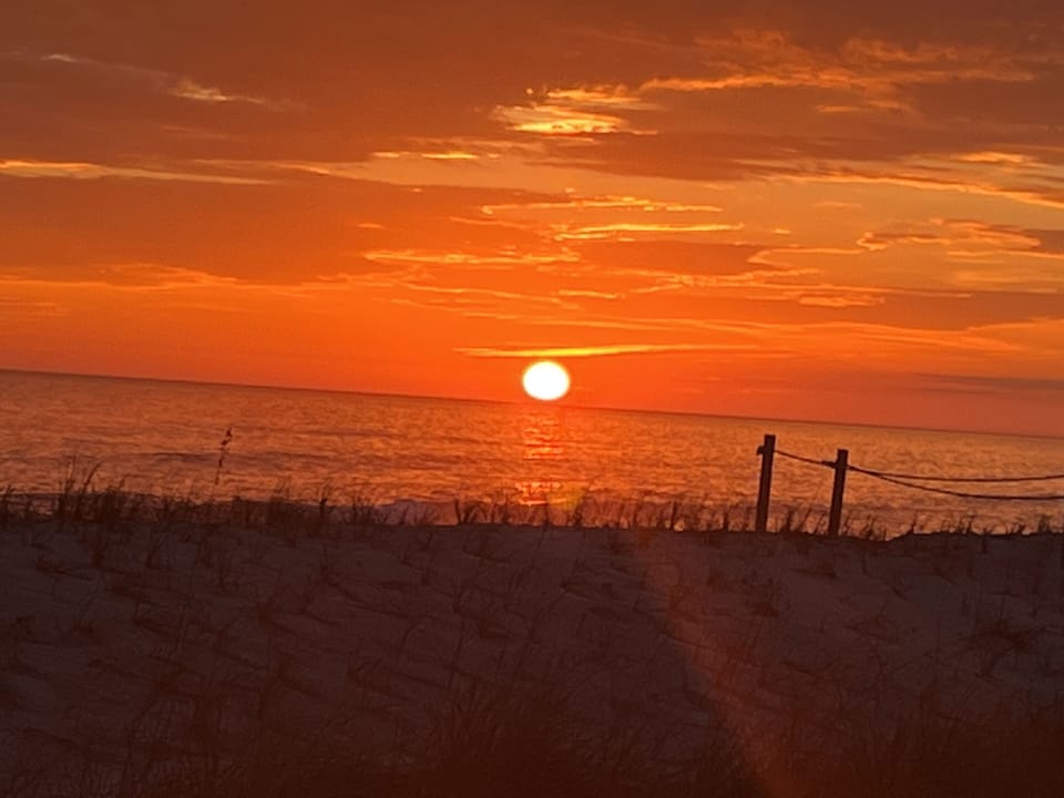 Beautiful Oak Island Sunset from your porch
