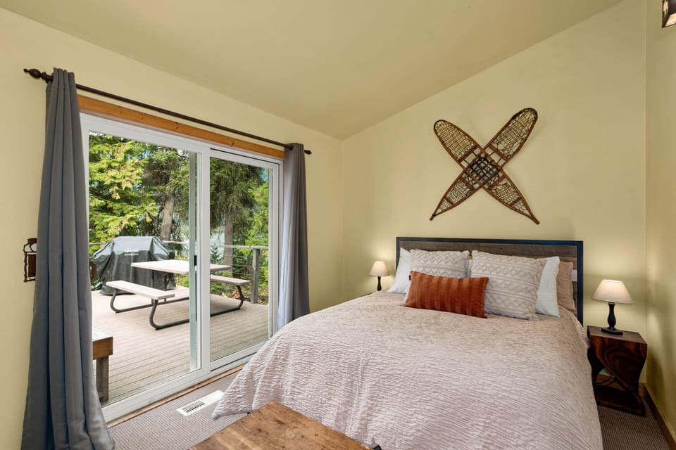 Bedroom 1 with Queen bed and deck access
