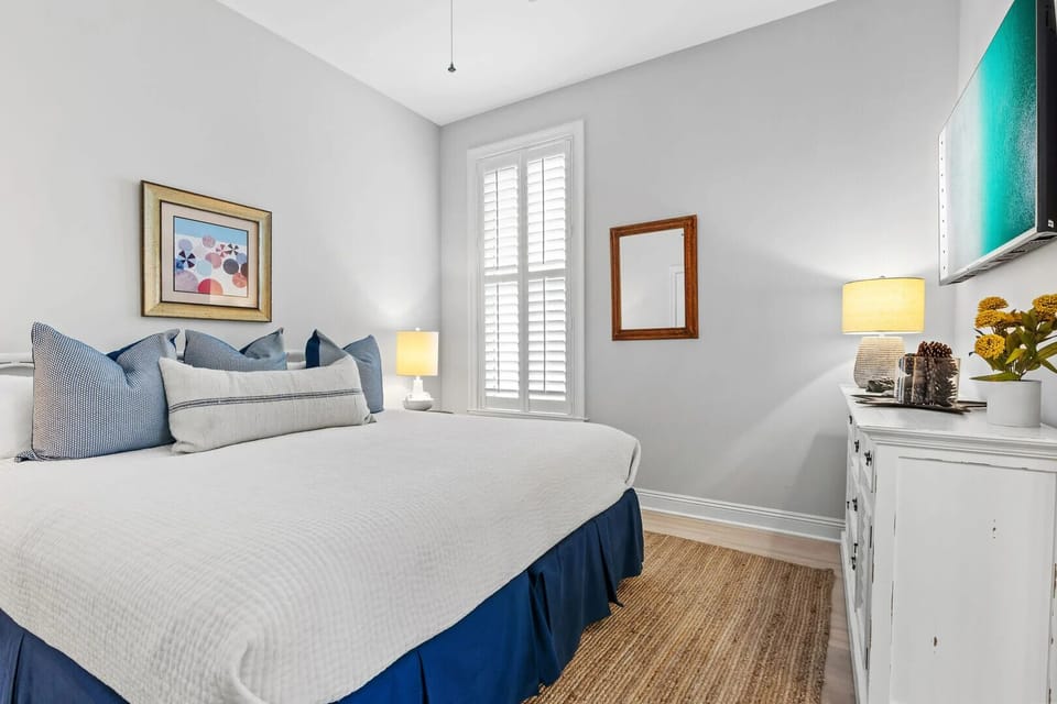 Bedroom 2 features a king bed and an ensuite bathroom.