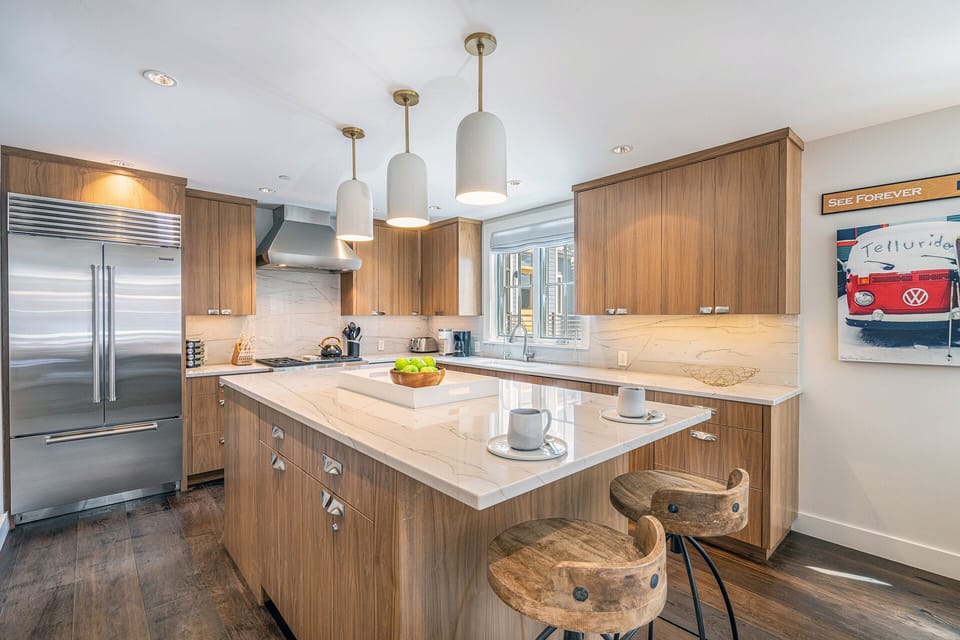 The extended island offers the perfect place to enjoy your morning coffee.