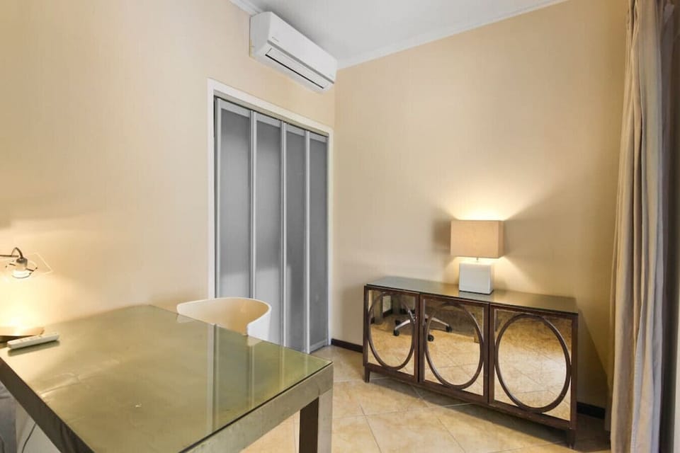 Stay productive and comfortable during your stay with our dedicated workspace. Our spacious desk and comfortable chair offer the perfect spot to catch up on work or simply plan your itinerary for the day.
