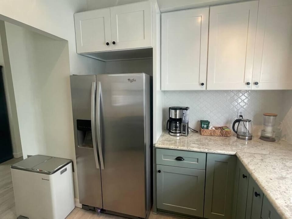 Roomy fridge, coffee and tea station, and filtered water are all readily available. 