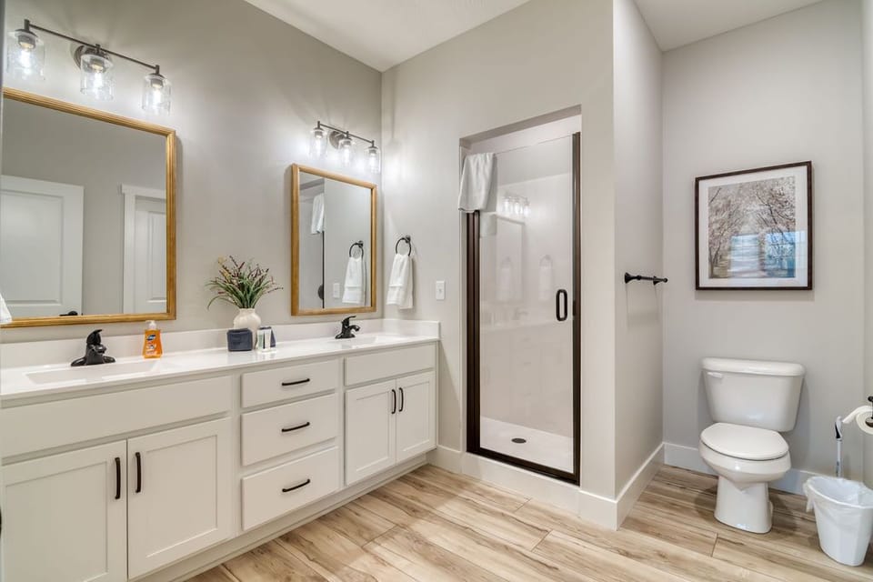 The master bathroom has a walk-in shower with just a small step to get in. 