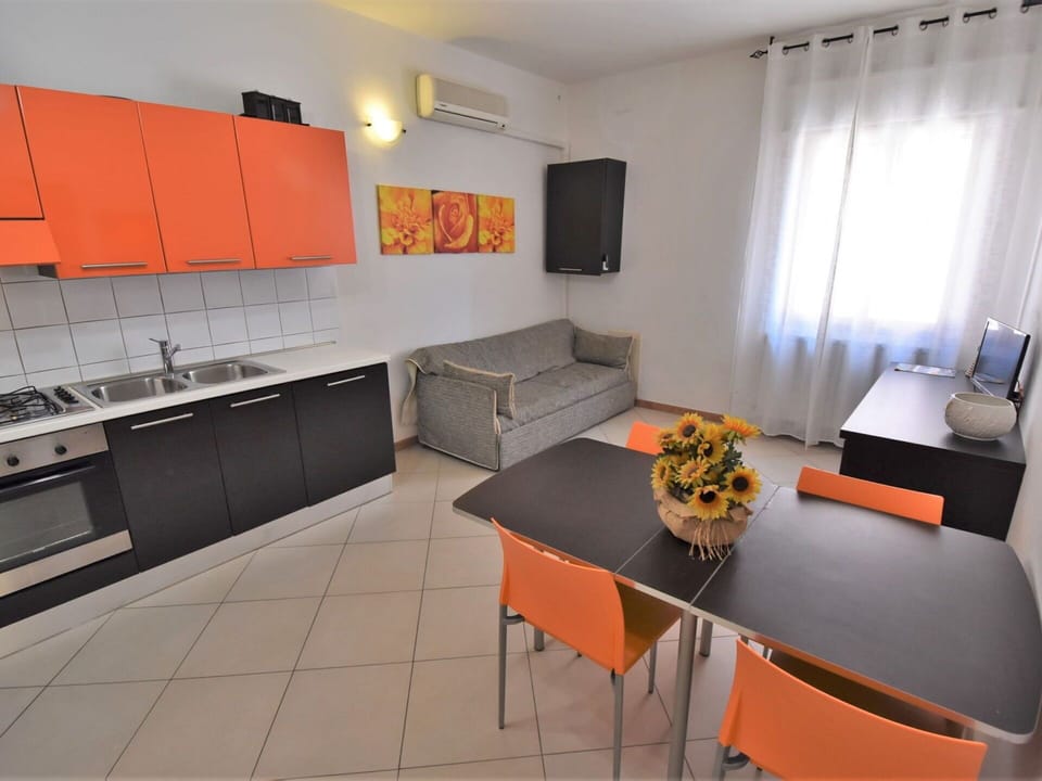 Table, Furniture, Flower, Couch, Orange, Lighting, Curtain, Floor, Interior Design, Flooring