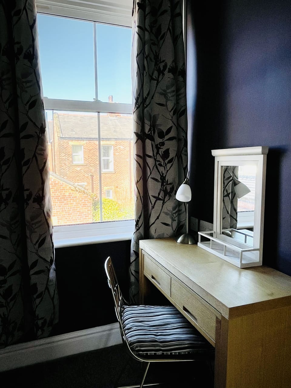 Landing area desk and chair. Great work area or beauty area.