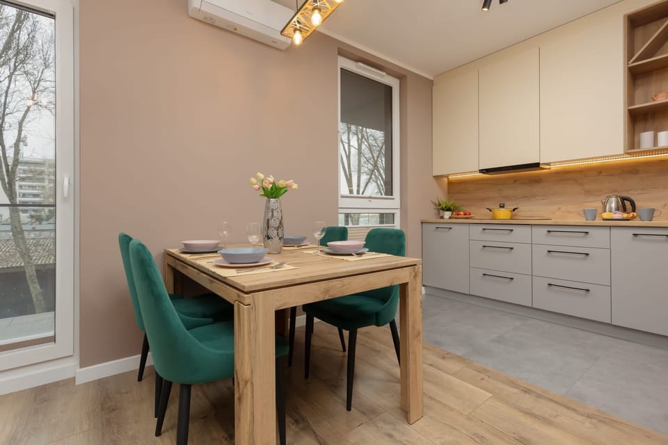 Another angle of the dining area, with a focus on its comfortable seating and elegant decor.
