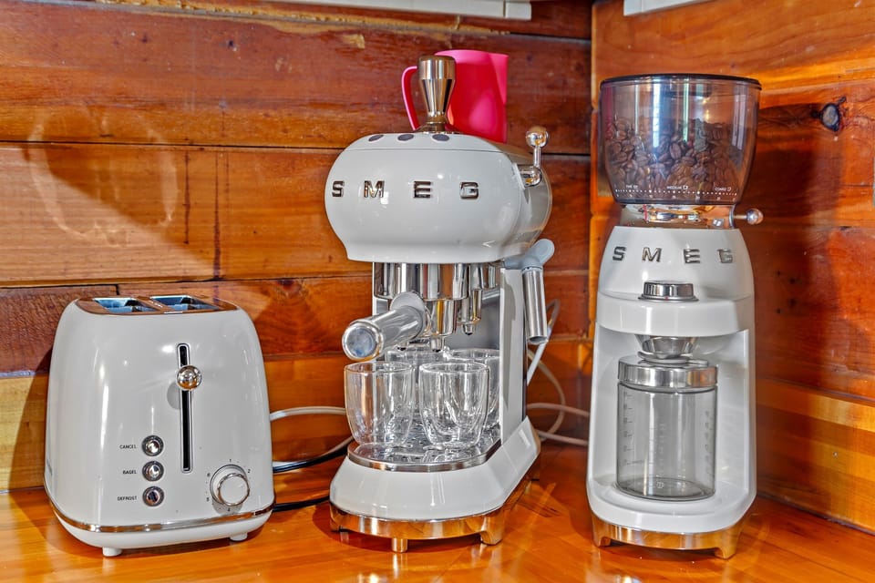 The coffee bar at Stella Blue is unmatched - enjoy your morning espresso drink from the SMEG espresso machine and bean grinder