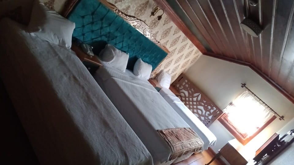 Standard Quadruple Room | Desk, free WiFi, bed sheets