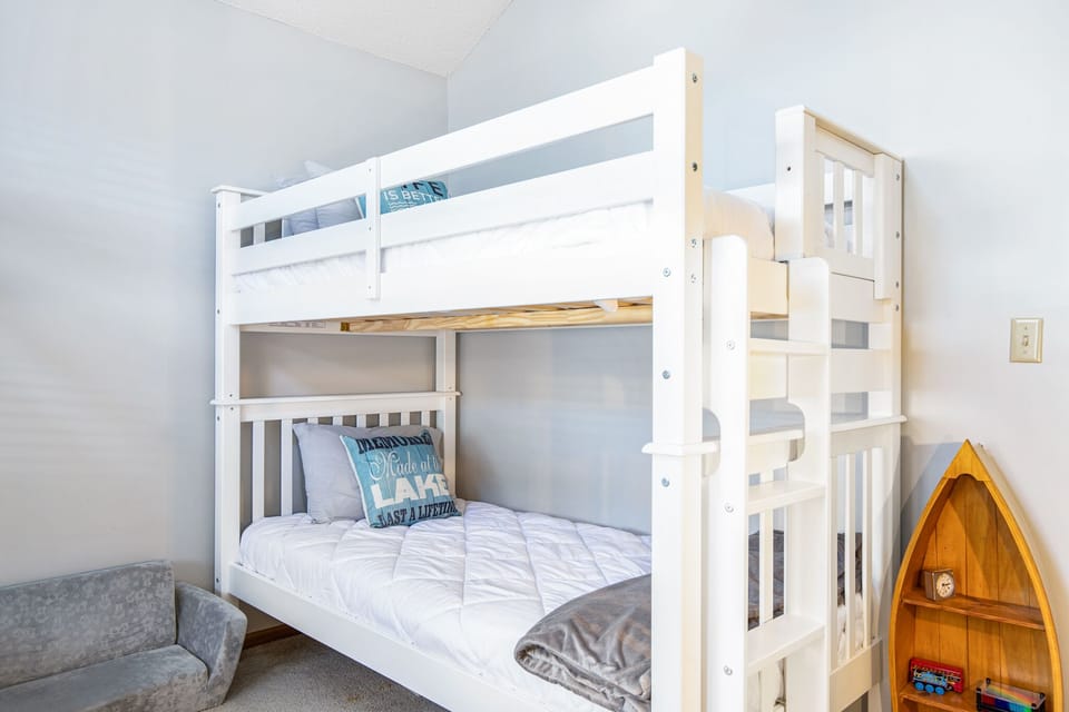 Twin over Twin bunk with trundle and mat options for alternate sleeping