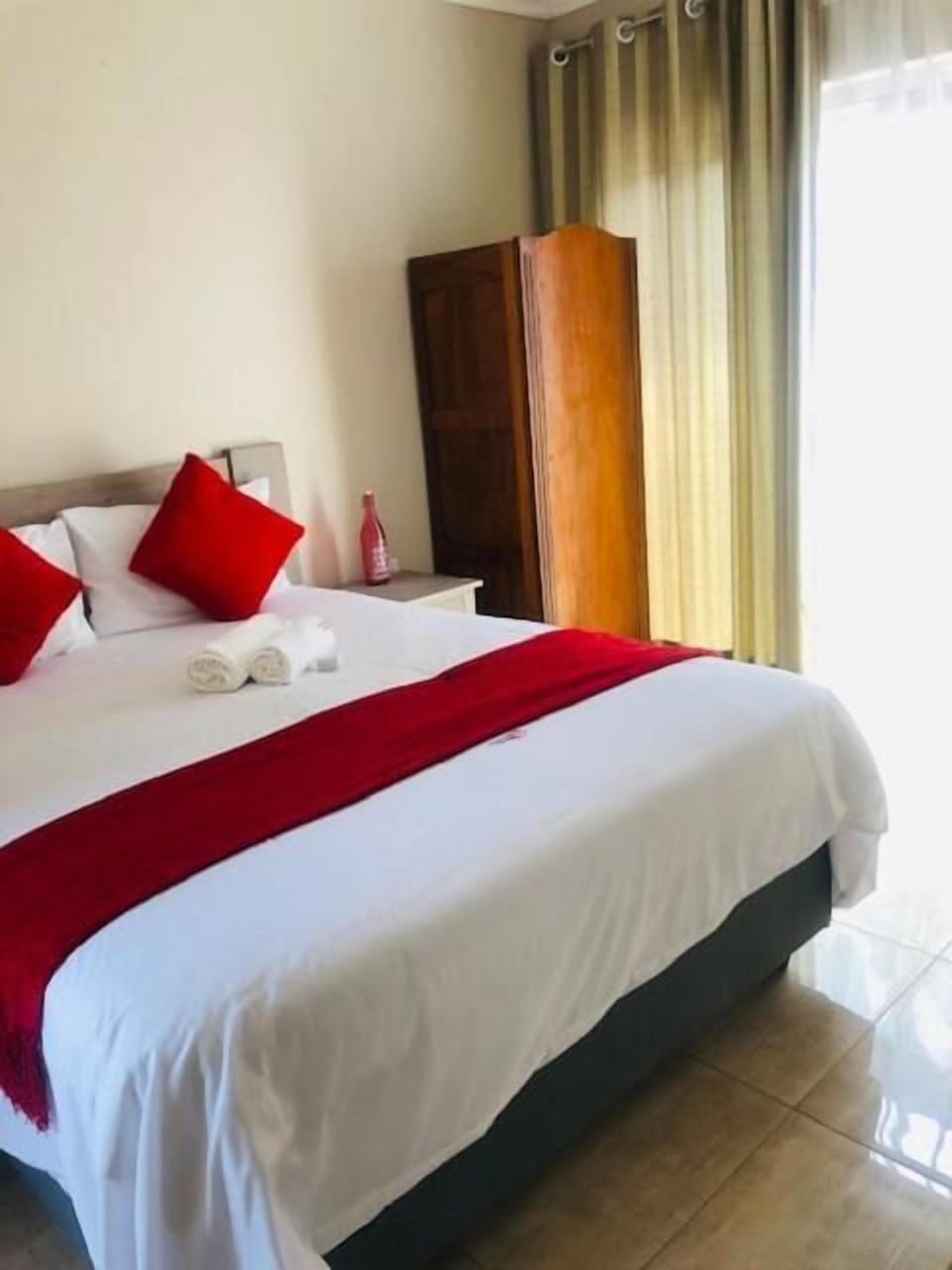Premium bedding, down comforters, iron/ironing board (on request)