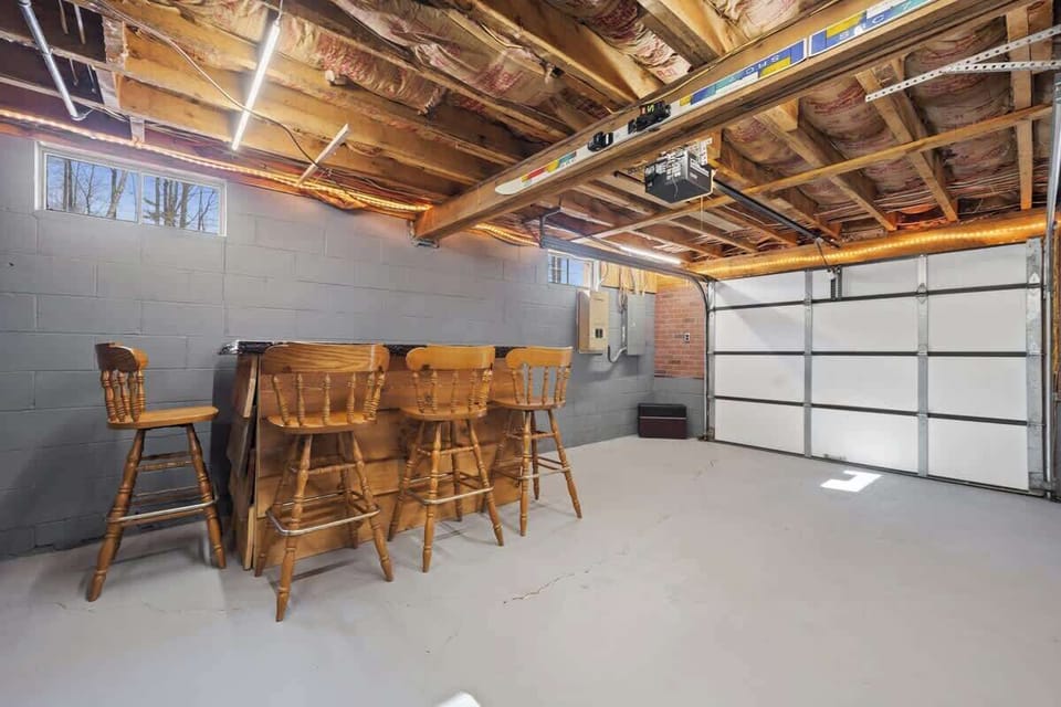 Enjoy a drink after a long day at this custom built wood bar!