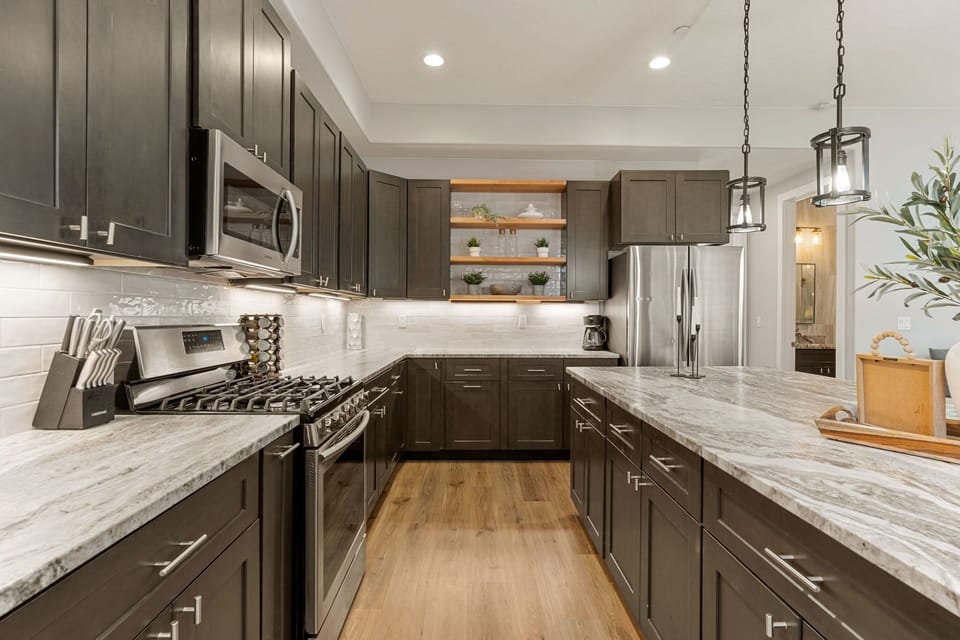 Townhome, 4 Bedrooms | Private kitchen | Fridge, oven, coffee/tea maker, toaster