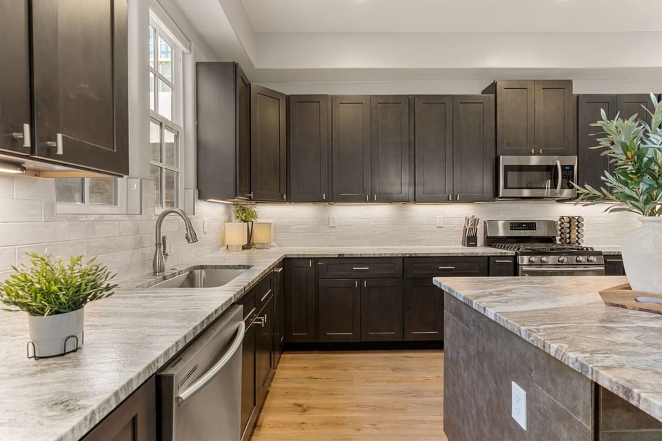 Townhome, 4 Bedrooms | Private kitchen | Fridge, oven, coffee/tea maker, toaster