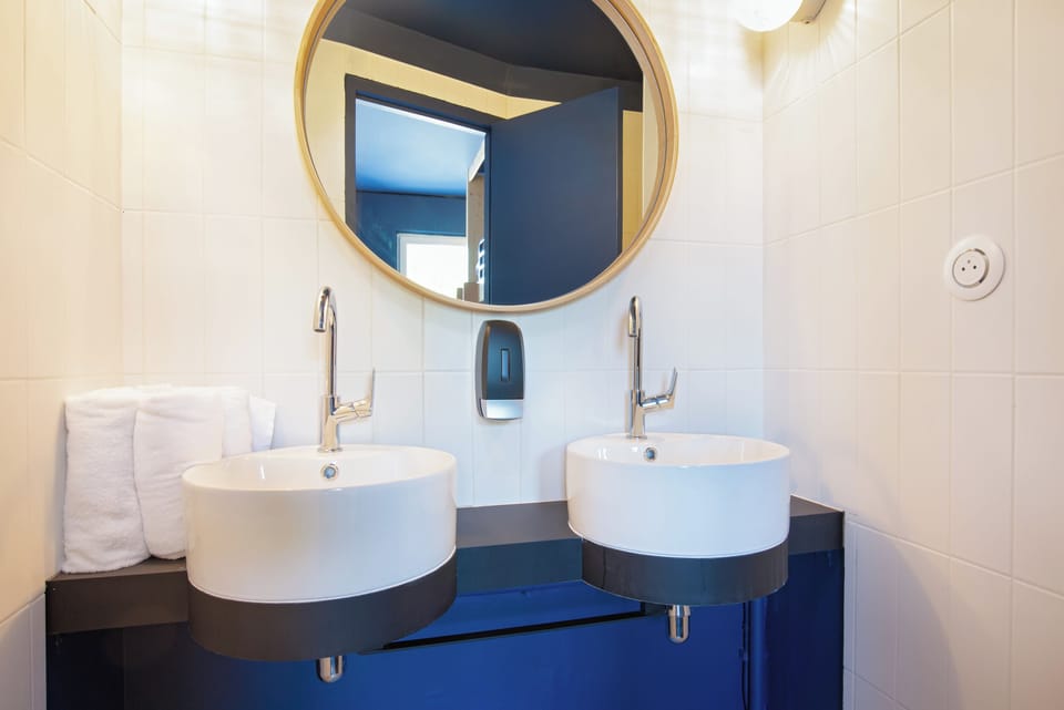 Shower, rainfall showerhead, eco-friendly toiletries, hair dryer
