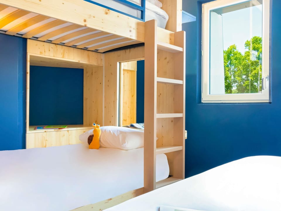 Premium bedding, laptop workspace, soundproofing, iron/ironing board