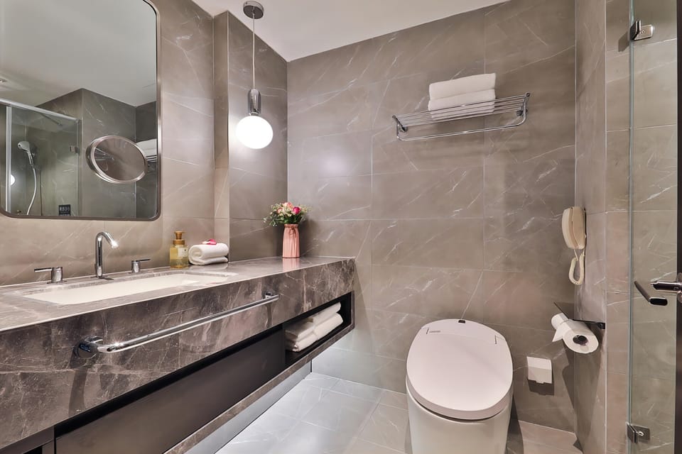 Eco-friendly toiletries, hair dryer, bathrobes, towels