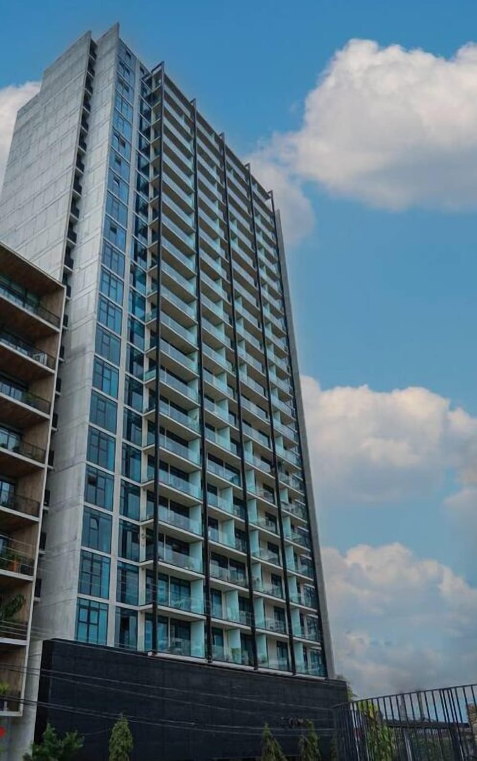 This 18th floor apartment balcony lets you enjoy mountains and city lights views