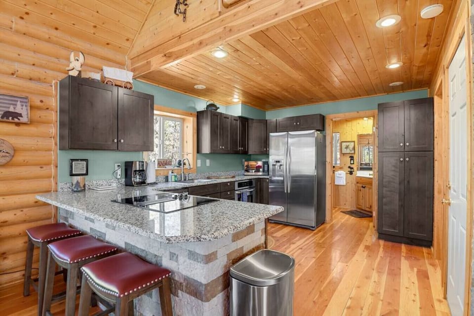 Kitchen is Stocked with Drip Coffee maker, Coffee, Creamer, Sugar, Teas, and Spices.