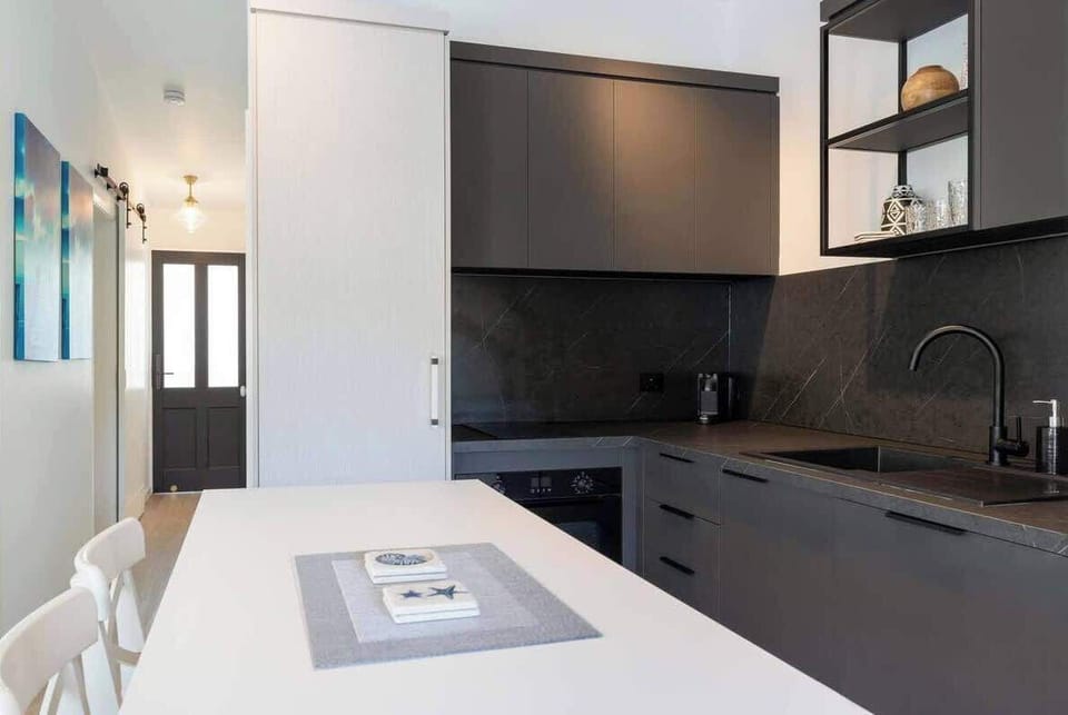 The kitchen offers everything you'll need to cook meals at home.