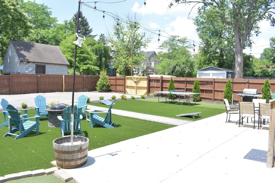 The fenced yard will keep the little ones secure as they play.