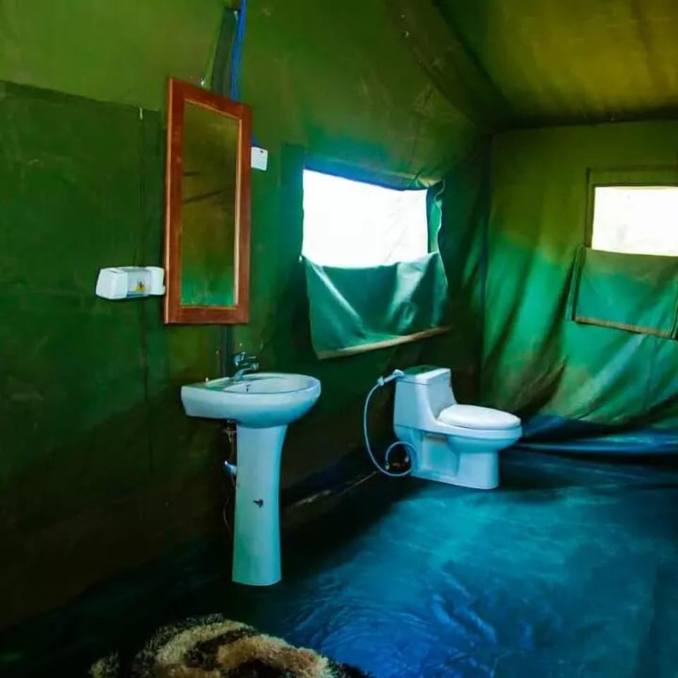 Luxury Tent | Bathroom amenities | Slippers, towels
