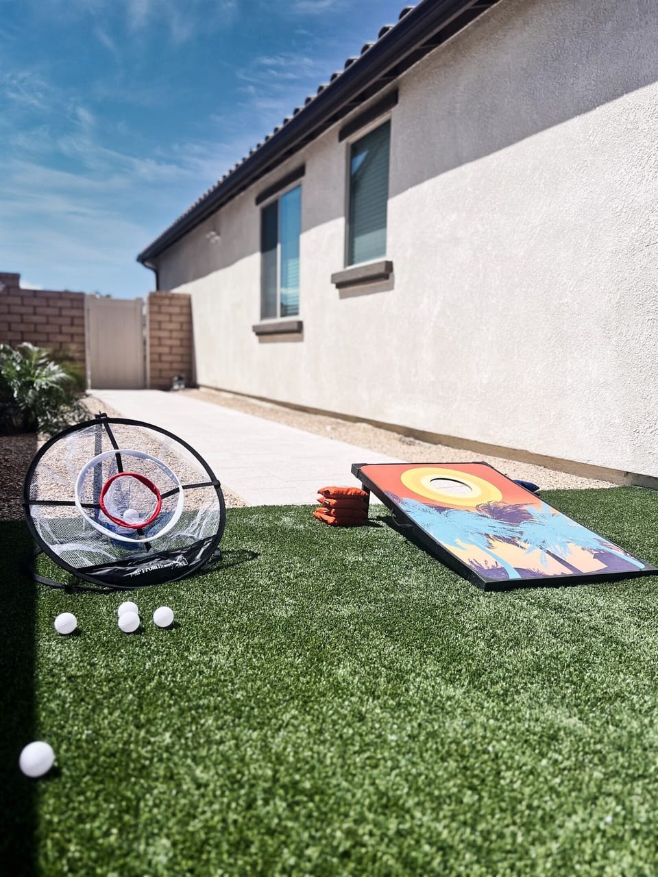 Golf chipper (no club), Cornhole, and XL Jenga