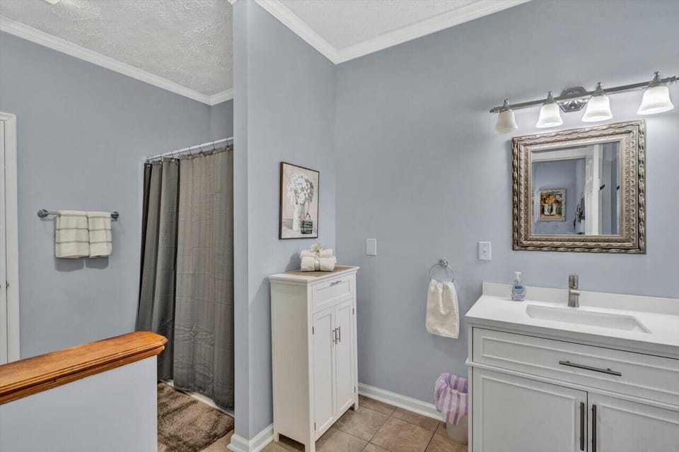 Refresh yourself in a well-appointed bathroom with elegant touches and plenty of space.