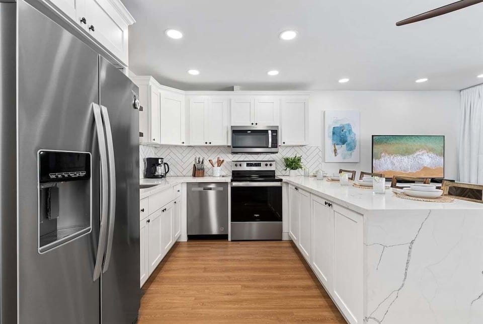Spacious fully equipped kitchen with stainless steel appliances