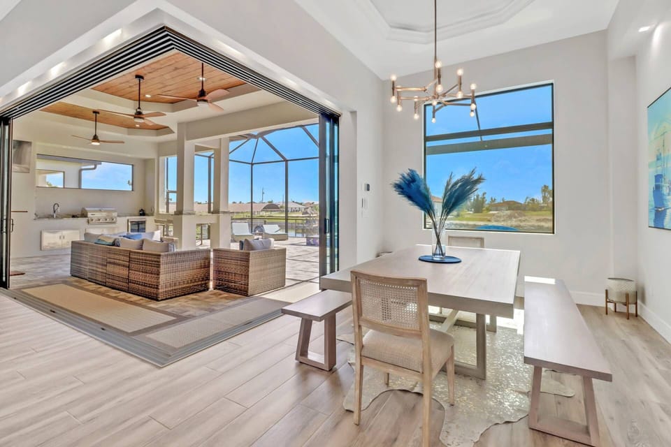 Enjoy a meal or family game night gathered around the dining table at the back of the home.