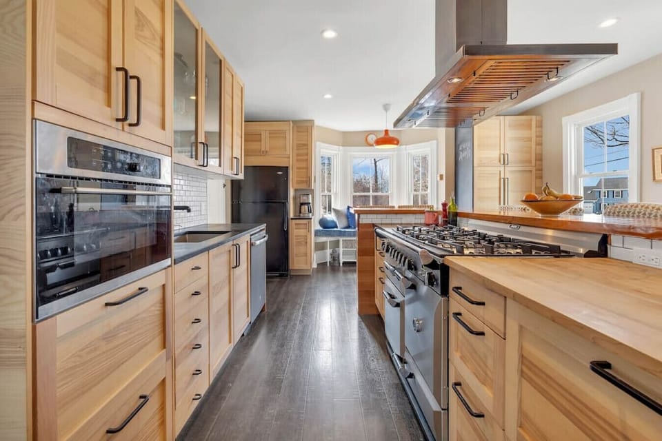Brand new updated & modern kitchen. Slate and butcher block countertops and bar seating for 8. Fully equipped for all of your cooking needs, including a AGA propane stove, zavor quick pot and kitchen aid stand mixer.