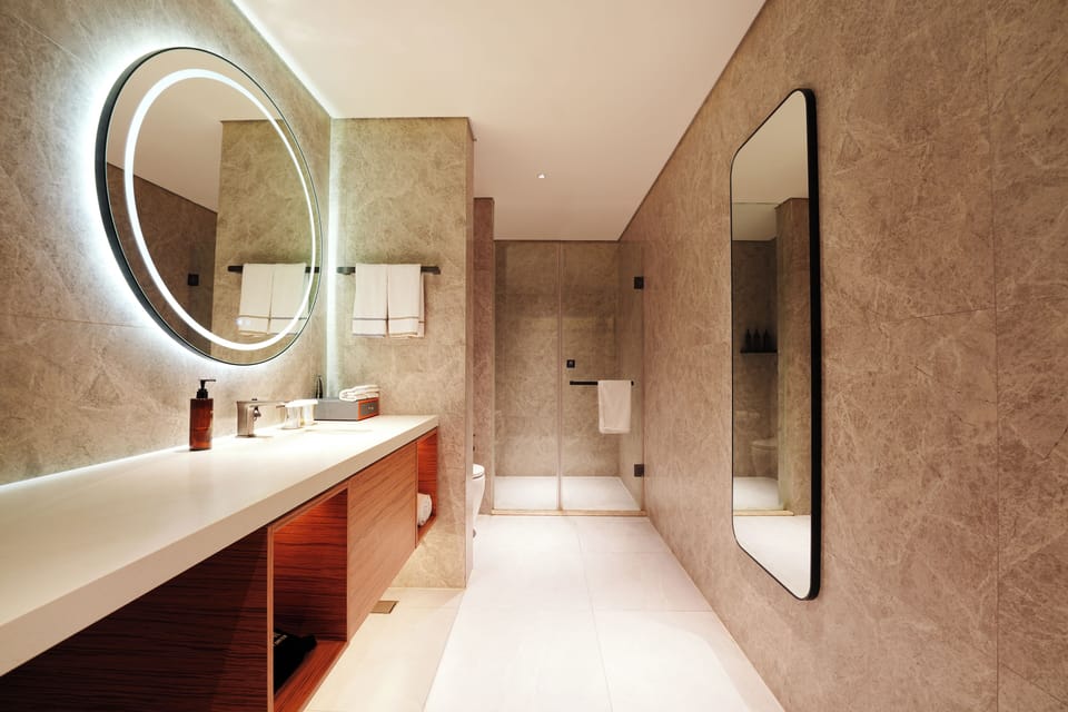 Standard King - Closed window | Bathroom | Shower, rainfall showerhead, designer toiletries, hair dryer