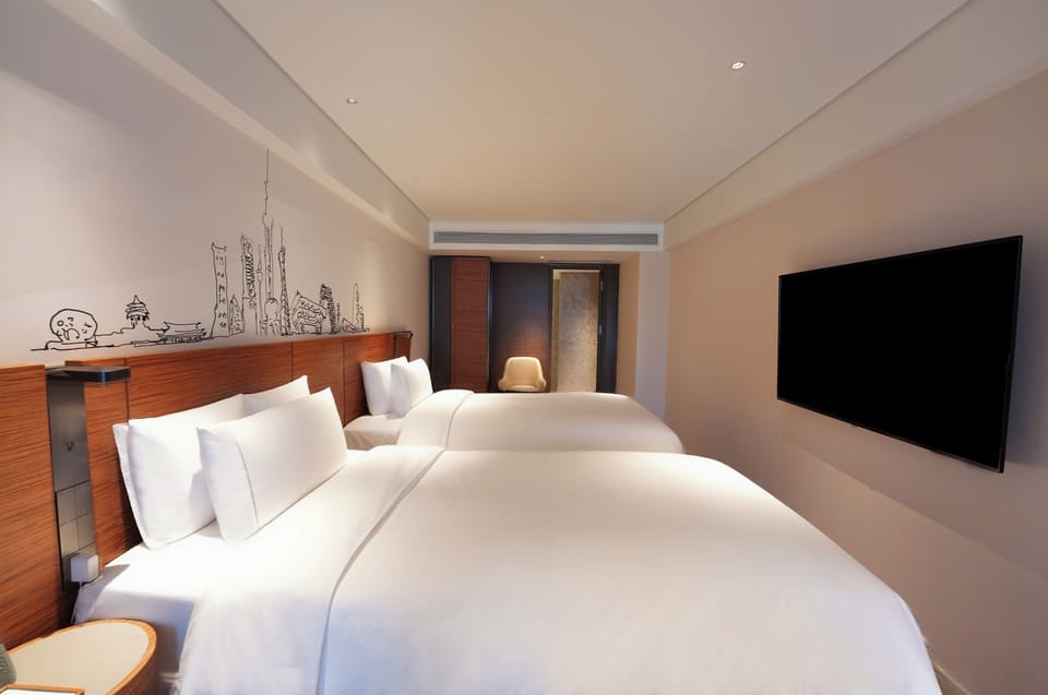 Executive Loft, Multiple Beds, Mezzanine | Living area | 55-inch LCD TV with cable channels, TV, pay movies